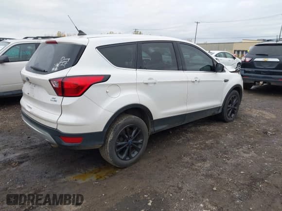 ✅ 2019 Ford Escape SE • VIN: 1FMCU9GD0KUB22962 • Lot: 43624487. Listed on IAAI with 80,842 mi. Free auction sales archive from the USA and detailed vehicle history report at DreamBid. Image 4.