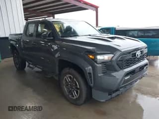 ✅ 2024 Toyota Tacoma SR5 • VIN: 3TMKB5FN8RM014421 • Lot: 41546765. Listed on IAAI with 1,009 mi. Free auction sales archive from the USA and detailed vehicle history report at DreamBid. Image 1.