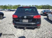 ✅ 2013 Volkswagen Touareg Exec • VIN: WVGEF9BP6DD008164 • Lot: 57117945. Listed on Copart with 8,310 mi. Free auction sales archive from the USA and detailed vehicle history report at DreamBid. Image 6.