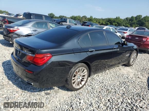 ✅ 2013 BMW 7 Series 750i • VIN: WBAYA8C51DC996710 • Lot: 69549145. Listed on Copart with 158,580 mi. Free auction sales archive from the USA and detailed vehicle history report at DreamBid. Image 3.