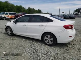 ✅ 2018 Chevrolet Cruze LS • VIN: 1G1BC5SM6J7168966 • Lot: 51833773. Listed on Copart with 72,369 mi. Free auction sales archive from the USA and detailed vehicle history report at DreamBid. Image 2.