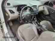 2014 Hyundai Tucson Limited z VIN KM8JUCAGXEU851031, wystawiony jako Copart lot #67409855 z przebiegiem 184 790 mil mil oraz Szkoda całkowita • Salvage title. Historia ofert i sprzedaży dostępna na DreamBid. Obrazek 8.