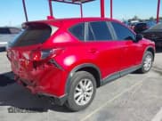 ✅ 2015 Mazda CX-5 Sport • VIN: JM3KE2BE6F0500131 • Lot: 43784489. Listed on IAAI with 149,701 mi. Free auction sales archive from the USA and detailed vehicle history report at DreamBid. Image 4.