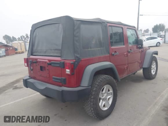 ✅ 2013 Jeep Wrangler Unlimited Sport • VIN: 1C4BJWDGXDL597727 • Лот: 43900338. Опубликован ранее на IAAI с пробегом 112 171 миль. Бесплатный доступ к архиву аукционных продаж из США и подробный отчёт об истории автомобиля на DreamBid. Изображение 4.