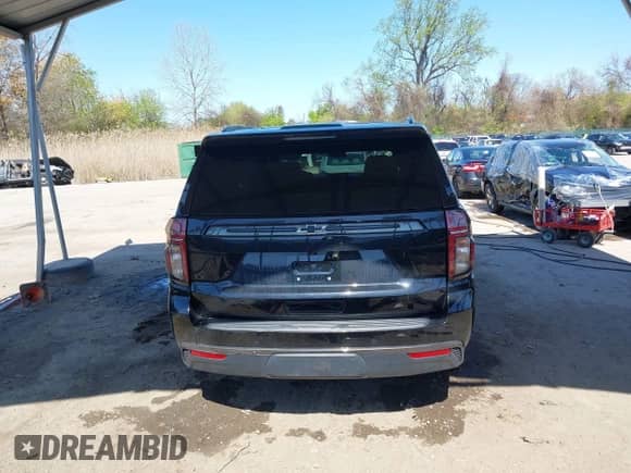 2022 Chevrolet Tahoe Z71 z VIN 1GNSKPKD1NR242429, wystawiony jako IAAI lot #42058520 z przebiegiem 63 699 mil mil oraz . Historia ofert i sprzedaży dostępna na DreamBid. Obrazek 16.