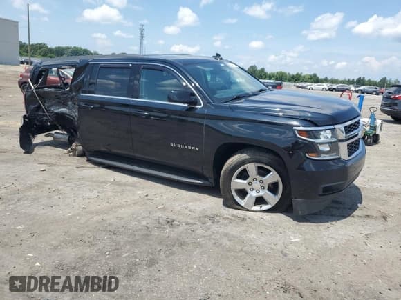 ✅ 2020 Chevrolet Suburban LS • VIN: 1GNSKGKC5LR272487 • Lot: 62207025. Listed on Copart with 54,191 mi. Free auction sales archive from the USA and detailed vehicle history report at DreamBid. Image 4.