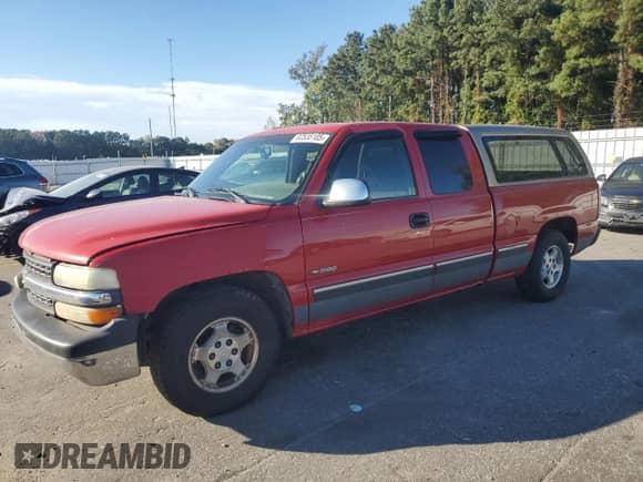 1999 Chevrolet Silverado 1500 LS z VIN 2GCEC19T1X1115057, wystawiony jako Copart lot #82535105 z przebiegiem 397 823 mil mil oraz Szkoda całkowita • Salvage title. Historia ofert i sprzedaży dostępna na DreamBid. Obrazek 1.