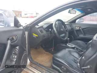 2003 Hyundai Tiburon GT z VIN KMHHN65F63U036899, wystawiony jako IAAI lot #42148935 z przebiegiem 203 485 mil mil oraz . Historia ofert i sprzedaży dostępna na DreamBid. Obrazek 5.