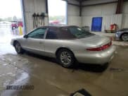 ✅ 1997 Lincoln Mark VIII LSC • VIN: 1LNLM92V7VY701217 • Lot: 56335175. Listed on Copart with 175,991 mi. Free auction sales archive from the USA and detailed vehicle history report at DreamBid. Image 2.