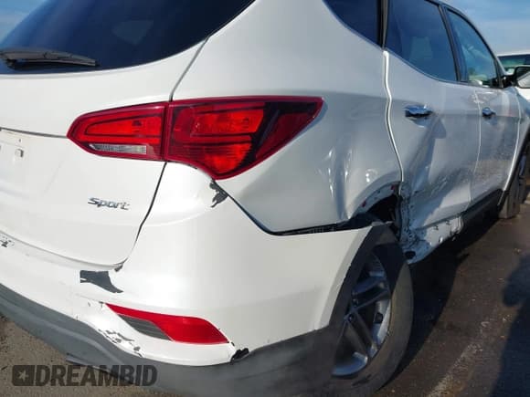 ✅ 2018 Hyundai Santa Fe 2.4L • VIN: 5NMZT3LB6JH086039 • Лот: 43639604. Опубликован ранее на IAAI с пробегом 90 196 миль. Бесплатный доступ к архиву аукционных продаж из США и подробный отчёт об истории автомобиля на DreamBid. Изображение 17.