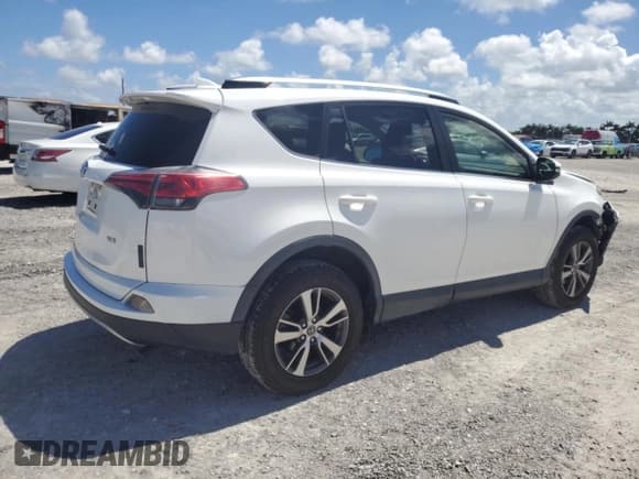 ✅ 2018 Toyota RAV4 XLE • VIN: JTMWFREVXJD127480 • Lot: 61004625. Listed on Copart with 33,179 mi. Free auction sales archive from the USA and detailed vehicle history report at DreamBid. Image 3.