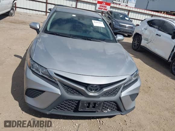 2019 Toyota Camry LE with VIN 4T1B11HK8KU175668, listed as a IAAI auction lot 43397625 with 260,310 mi miles and . Bid and sale history available at DreamBid. Image 12.