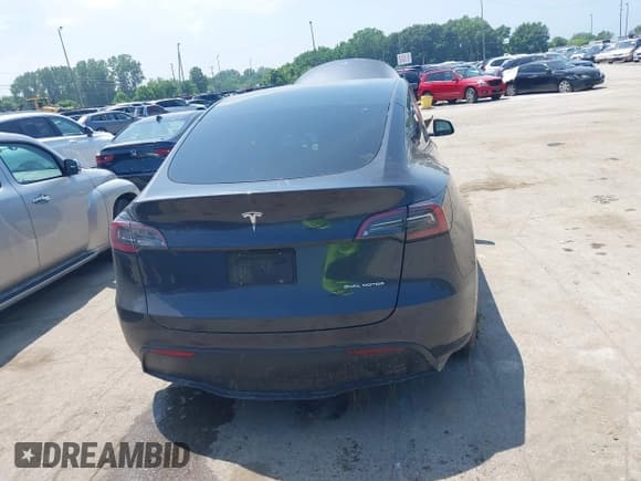 ✅ 2025 Tesla Model Y Long Range • VIN: 7SAYGDEE1SF303533 • Lot: 42584561. Listed on IAAI with 20,983 mi. Free auction sales archive from the USA and detailed vehicle history report at DreamBid. Image 16.