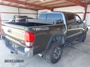 ✅ 2017 Toyota Tacoma SR5 • VIN: 3TMCZ5AN9HM062936 • Lot: 42236311. Listed on IAAI with 60,479 mi. Free auction sales archive from the USA and detailed vehicle history report at DreamBid. Image 4.