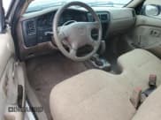 ✅ 2003 Toyota Tacoma • VIN: 5TENL42N43Z298893 • Lot: 61767915. Listed on Copart with 405,022 mi. Free auction sales archive from the USA and detailed vehicle history report at DreamBid. Image 8.