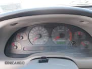 ✅ 2002 Ford Mustang Deluxe • VIN: 1FAFP44452F180074 • Lot: 43493558. Wystawiony na IAAI z przebiegiem 95 356 mil. Bezpłatny archiwum sprzedaży aukcyjnych z USA i szczegółowy raport historii pojazdu na DreamBid. Zdjęcie 7.