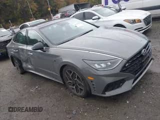 2023 Hyundai Sonata N Line with VIN KMHL14JC4PA261545, listed as a IAAI auction lot 43398148 with 67,022 mi miles and . Bid and sale history available at DreamBid. Image 1.