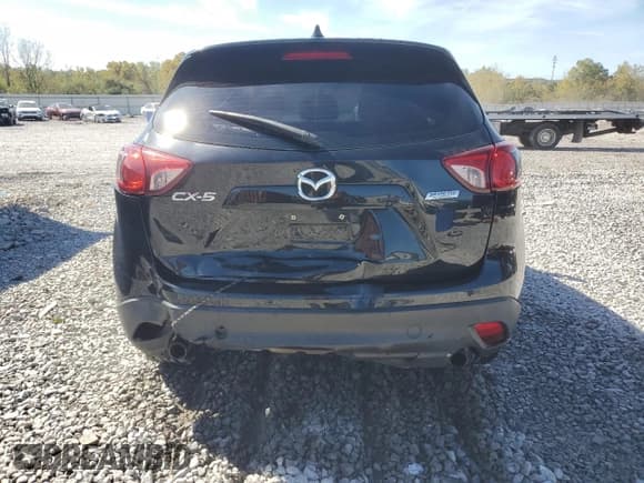 ✅ 2014 Mazda CX-5 Sport • VIN: JM3KE2BE5E0401105 • Lot: 89724645. Wystawiony na Copart z przebiegiem 175 888 mil. Bezpłatny archiwum sprzedaży aukcyjnych z USA i szczegółowy raport historii pojazdu na DreamBid. Zdjęcie 6.
