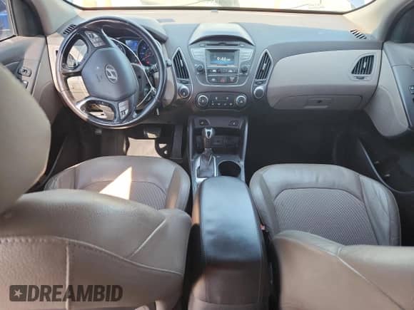 2014 Hyundai Tucson SE z VIN KM8JUCAG8EU914661, wystawiony jako Copart lot #70832365 z przebiegiem 176 893 mil mil oraz Czysty tytuł • Clean title. Historia ofert i sprzedaży dostępna na DreamBid. Obrazek 8.