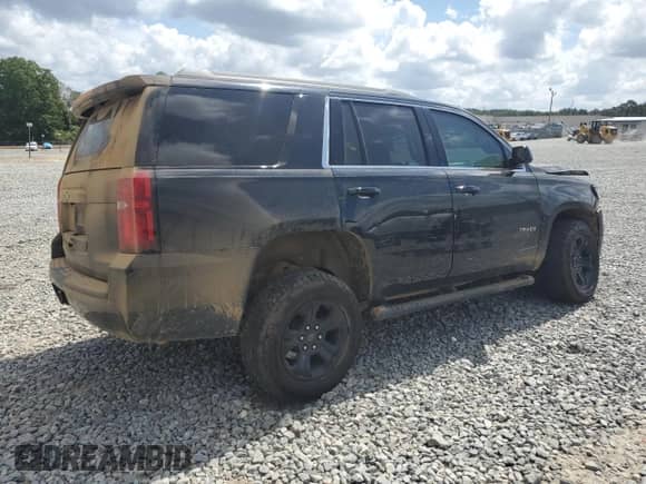 2019 Chevrolet Tahoe LS с VIN 1GNSCAEC1KR374535, выставлен на аукционе Copart как лот 81609295 с пробегом 100 726 миль миль и Списание • Salvage title. История ставок и продаж доступна на DreamBid. Изображение 3.