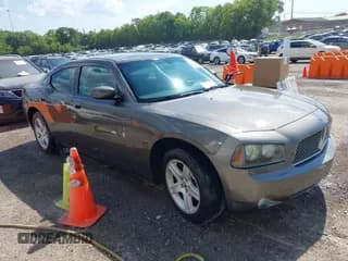 ✅ 2010 Dodge Charger • VIN: 2B3CA4CV9AH148140 • Lot: 42855701. Wystawiony na IAAI z przebiegiem 212 309 mil. Bezpłatny archiwum sprzedaży aukcyjnych z USA i szczegółowy raport historii pojazdu na DreamBid. Zdjęcie 1.