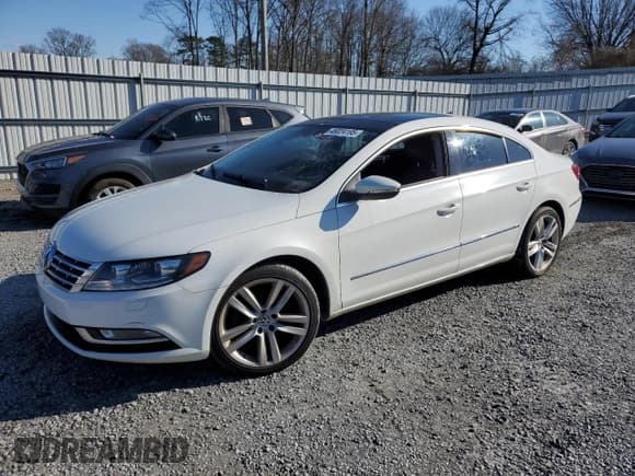 ✅ 2014 Volkswagen CC Executive • VIN: WVWRN7AN1EE506295 • Lot: 46024195. Listed on Copart with 143,535 mi. Free auction sales archive from the USA and detailed vehicle history report at DreamBid. Image 1.