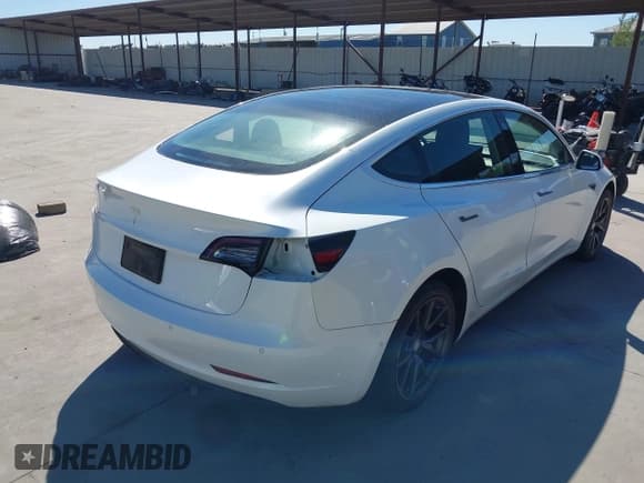 ✅ 2018 Tesla Model 3 Long Range Battery • VIN: 5YJ3E1EA8JF162144 • Lot: 43515448. Listed on IAAI with 190,331 mi. Free auction sales archive from the USA and detailed vehicle history report at DreamBid. Image 4.