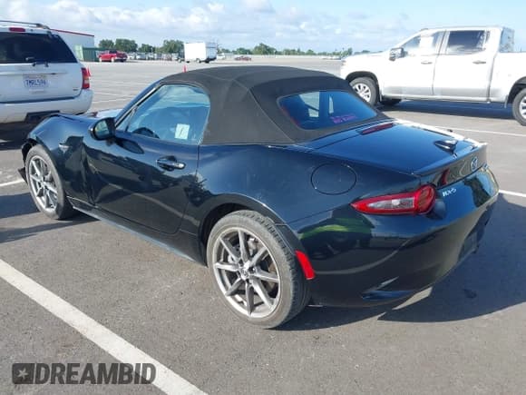 ✅ 2023 Mazda MX-5 Miata Grand Touring • VIN: JM1NDAD71P0553841 • Lot: 42111567. Wystawiony na IAAI z przebiegiem 27 058 mil. Bezpłatny archiwum sprzedaży aukcyjnych z USA i szczegółowy raport historii pojazdu na DreamBid. Zdjęcie 3.