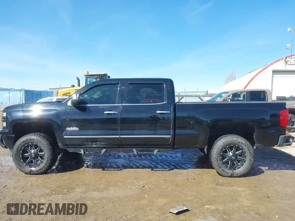 ✅ 2015 Chevrolet Silverado 1500 High Country • VIN: 3GCUKTEJ6FG272653 • Лот: 41820225. Опубликован ранее на IAAI с пробегом 130 953 миль. Бесплатный доступ к архиву аукционных продаж из США и подробный отчёт об истории автомобиля на DreamBid. Изображение 14.