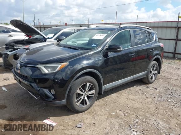 ✅ 2016 Toyota RAV4 XLE • VIN: 2T3RFREV2GW499811 • Lot: 43278390. Listed on IAAI with 148,028 mi. Free auction sales archive from the USA and detailed vehicle history report at DreamBid. Image 2.