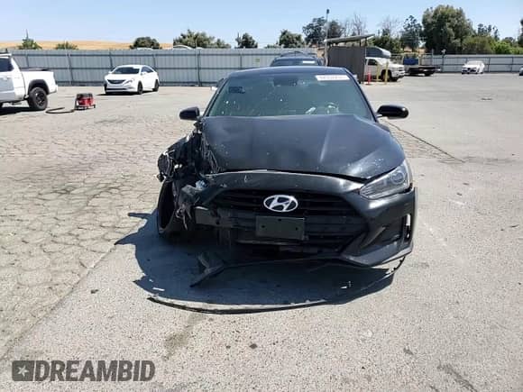 2020 Hyundai Veloster Premium z VIN KMHTG6AF6LU029753, wystawiony jako Copart lot #62052255 z przebiegiem 128 615 mil mil oraz Szkoda całkowita • Salvage title. Historia ofert i sprzedaży dostępna na DreamBid. Obrazek 13.