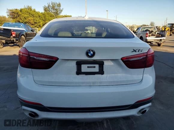 ✅ 2015 BMW X6 xDrive35i • VIN: 5UXKU2C54F0F95994 • Lot: 93351645. Listed on Copart with 164,540 mi. Free auction sales archive from the USA and detailed vehicle history report at DreamBid. Image 6.