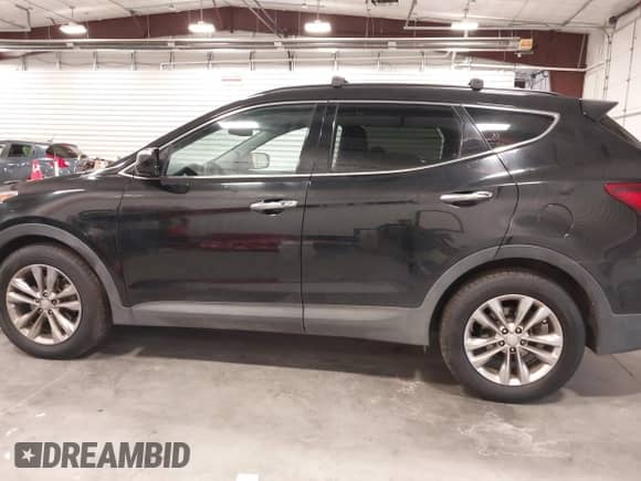 2017 Hyundai Santa Fe 2.0T z VIN 5XYZUDLA9HG433491, wystawiony jako IAAI lot #43298379 z przebiegiem 135 099 mil mil oraz . Historia ofert i sprzedaży dostępna na DreamBid. Obrazek 14.