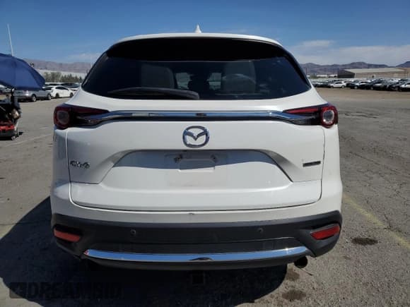 ✅ 2021 Mazda CX-9 Carbon Edition • VIN: JM3TCADY4M0500010 • Lot: 53283005. Listed on Copart with 55,762 mi. Free auction sales archive from the USA and detailed vehicle history report at DreamBid. Image 6.