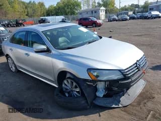 ✅ 2013 Volkswagen Passat SEL • VIN: 1VWCP7A37DC068923 • Lot: 40391198. Listed on IAAI with 136,483 mi. Free auction sales archive from the USA and detailed vehicle history report at DreamBid. Image 1.