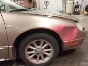 ✅ 2000 Chrysler LHS • VIN: 2C3HC56G9YH327598 • Lot: 42721520. Listed on IAAI with 141,235 mi. Free auction sales archive from the USA and detailed vehicle history report at DreamBid. Image 18.