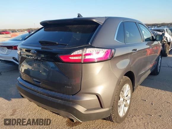 ✅ 2023 Ford Edge Titanium • VIN: 2FMPK4K97PBA27258 • Lot: 43836984. Wystawiony na IAAI z przebiegiem 57 336 mil. Bezpłatny archiwum sprzedaży aukcyjnych z USA i szczegółowy raport historii pojazdu na DreamBid. Zdjęcie 4.