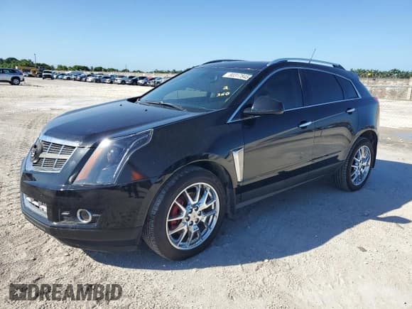 ✅ 2014 Cadillac SRX Performance Collection • VIN: 3GYFNCE36ES517992 • Лот: 80317845. Опубликован ранее на Copart с пробегом 98 735 миль. Бесплатный доступ к архиву аукционных продаж из США и подробный отчёт об истории автомобиля на DreamBid. Изображение 1.
