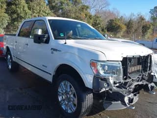 ✅ 2014 Ford F-150 Platinum • VIN: 1FTFW1ET1EFB56201 • Lot: 43709618. Listed on IAAI with 133,110 mi. Free auction sales archive from the USA and detailed vehicle history report at DreamBid. Image 1.