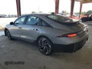 ✅ 2025 Hyundai Ioniq 6 SEL • VIN: KMHM34AA4SA084761 • Лот: 70647875. Опубликован ранее на Copart с пробегом 9 914 миль. Бесплатный доступ к архиву аукционных продаж из США и подробный отчёт об истории автомобиля на DreamBid. Изображение 2.