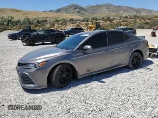 2021 Toyota Camry LE with VIN 4T1C11BKXMU023553, listed as a Copart auction lot 63910845 with 48,197 mi miles and Salvage title. Bid and sale history available at DreamBid. Image 1.