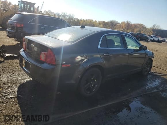 ✅ 2012 Chevrolet Malibu 1FL • VIN: 1G1ZA5E04CF386071 • Lot: 77001824. Listed on Copart with 191,924 mi. Free auction sales archive from the USA and detailed vehicle history report at DreamBid. Image 3.