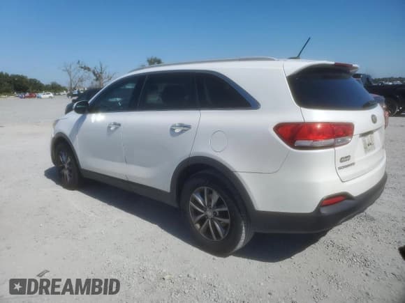 ✅ 2017 Kia Sorento LX • VIN: 5XYPG4A50HG197432 • Лот: 90760055. Опубликован ранее на Copart с пробегом 99 882 миль. Бесплатный доступ к архиву аукционных продаж из США и подробный отчёт об истории автомобиля на DreamBid. Изображение 2.