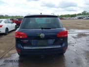 ✅ 2011 Volkswagen Touareg Sport • VIN: WVGFF9BP0BD002958 • Lot: 42281009. Listed on IAAI with 147,801 mi. Free auction sales archive from the USA and detailed vehicle history report at DreamBid. Image 17.