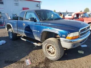 ✅ 2000 Dodge Dakota Sport • VIN: 1B7GG22N7YS524891 • Lot: 43276185. Wystawiony na IAAI z przebiegiem 194 501 mil. Bezpłatny archiwum sprzedaży aukcyjnych z USA i szczegółowy raport historii pojazdu na DreamBid. Zdjęcie 1.