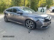 ✅ 2020 Honda Civic Touring • VIN: 2HGFC1F91LH101871 • Lot: 69984645. Listed on Copart with 75,445 mi. Free auction sales archive from the USA and detailed vehicle history report at DreamBid. Image 4.