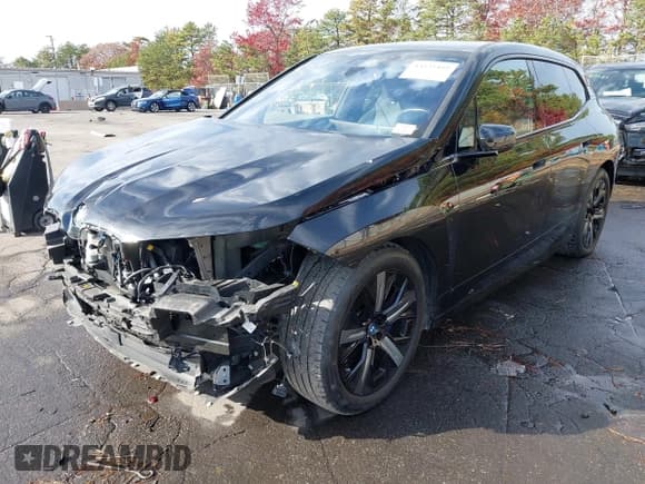 ✅ 2022 BMW iX xDrive50 • VIN: WB523CF04NCK84422 • Lot: 43535492. Wystawiony na IAAI z przebiegiem 42 152 mil. Bezpłatny archiwum sprzedaży aukcyjnych z USA i szczegółowy raport historii pojazdu na DreamBid. Zdjęcie 2.