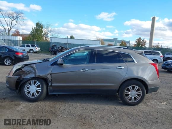 ✅ 2011 Cadillac SRX Luxury Collection • VIN: 3GYFNDEY7BS659832 • Lot: 43642277. Wystawiony na IAAI z przebiegiem 192 904 mil. Bezpłatny archiwum sprzedaży aukcyjnych z USA i szczegółowy raport historii pojazdu na DreamBid. Zdjęcie 13.