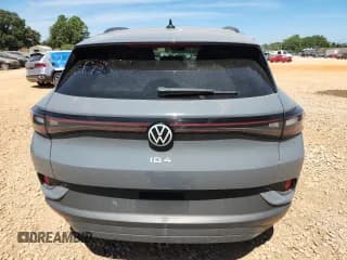 ✅ 2023 Volkswagen ID.4 Pro S • VIN: 1V2WNPE87PC025309 • Лот: 70362175. Опубликован ранее на Copart с пробегом 12 824 миль. Бесплатный доступ к архиву аукционных продаж из США и подробный отчёт об истории автомобиля на DreamBid. Изображение 6.