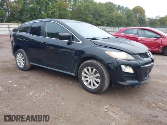 ✅ 2012 Mazda CX-7 i Touring • VIN: JM3ER2CM5C0412884 • Lot: 43293357. Wystawiony na IAAI z przebiegiem 151 022 mil. Bezpłatny archiwum sprzedaży aukcyjnych z USA i szczegółowy raport historii pojazdu na DreamBid. Zdjęcie 1.